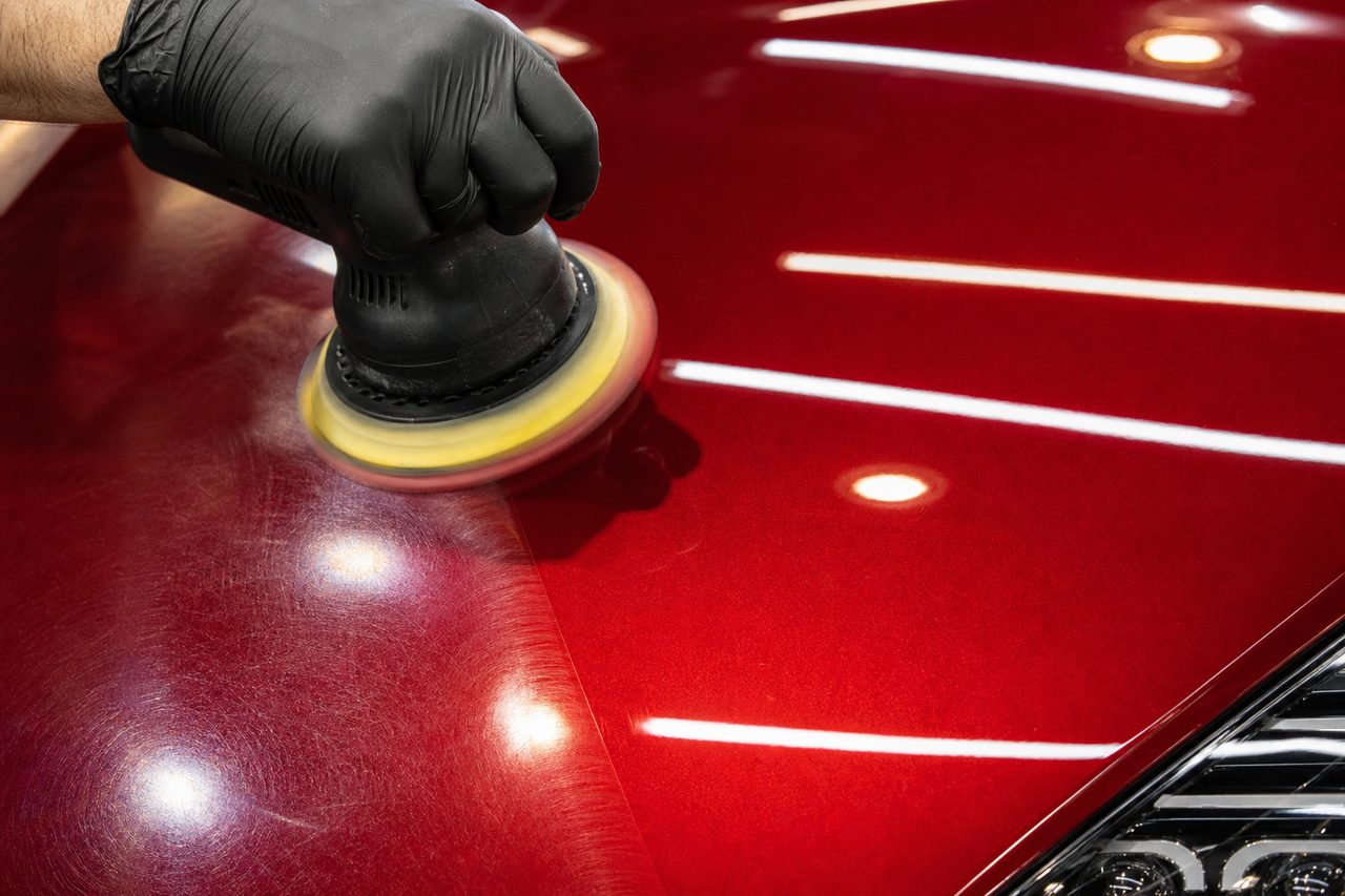 Machine paint correction, half corrected and half swirled